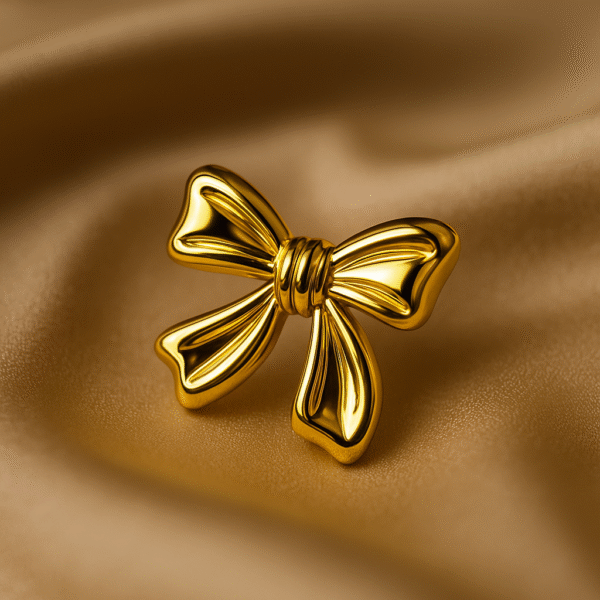 Statement bow earrings in glossy gold finish - Image 2